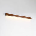 Walnut colour wood and acrylic wall lamp strip with LED lighting in a minimalist design on a wall.