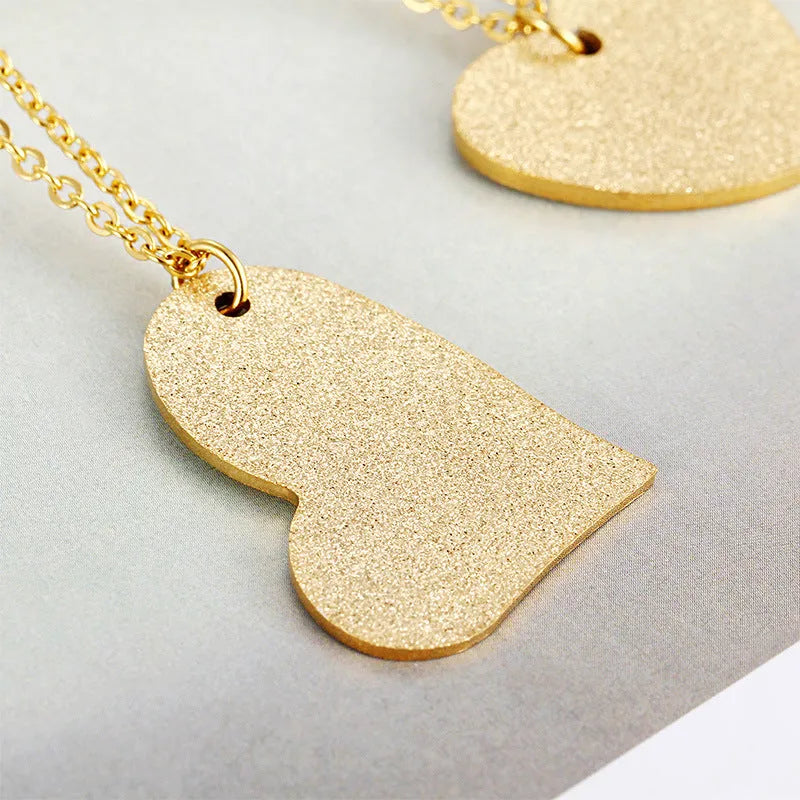 Geometric heart-shaped titanium steel pendant necklace on a chain