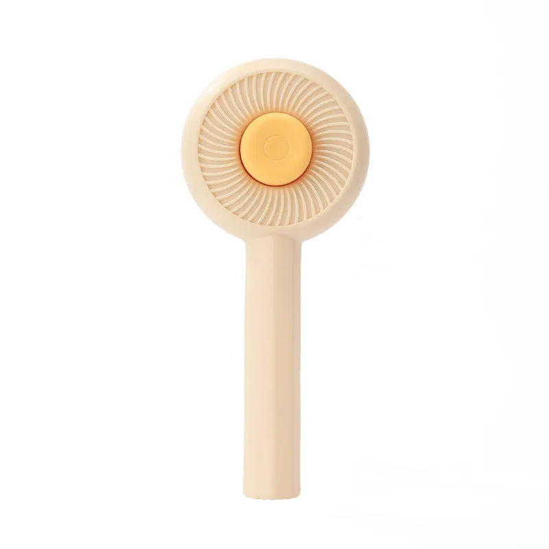 Blue pet grooming brush with self-cleaning button and angled metal bristles