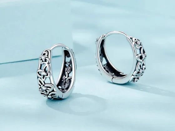 S925 sterling silver retro hollow butterfly drop earrings with zircon stones on an 11mm hoop.