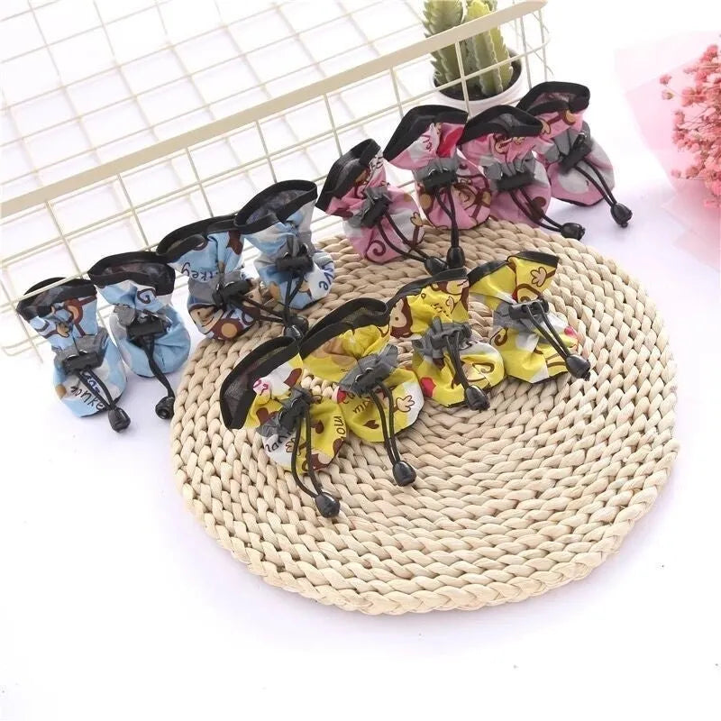 Set of four dog shoes in cloth material with soft soles, shown in multiple colour options including fleece-lined variants