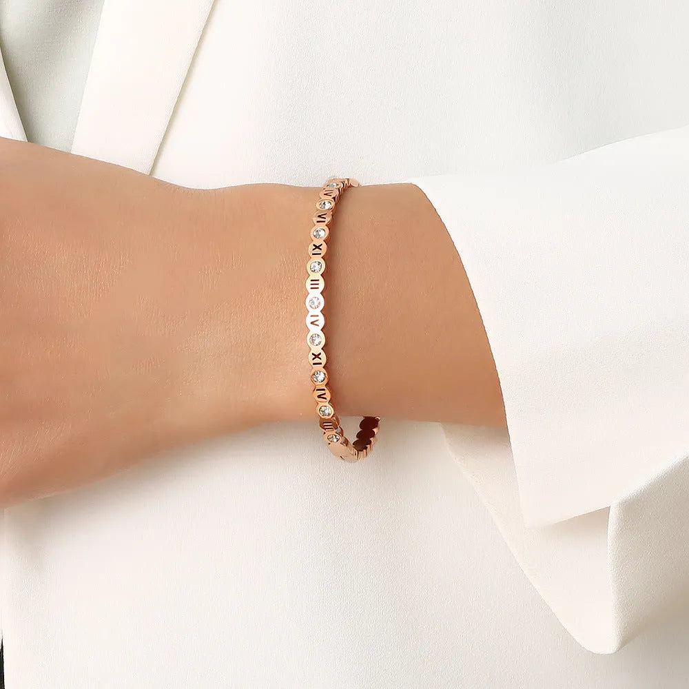 Korean style titanium steel bracelet with number detailing in gold, rose gold, or steel colour options