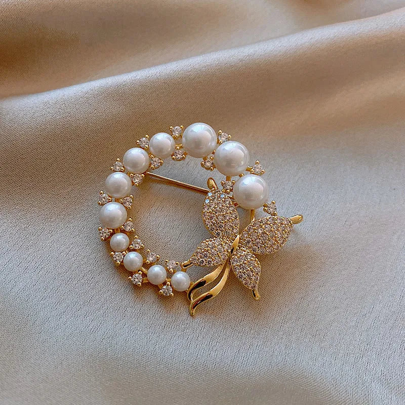 Alloy brooch in natural flower shape with electroplated finish, featuring adjustable and anti-exposure pin closure for women's coats and suits.
