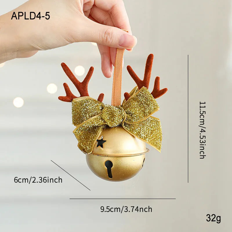 Wrought iron mixed pendant with antlers, bowknot, pine cone, and bell in golden finish