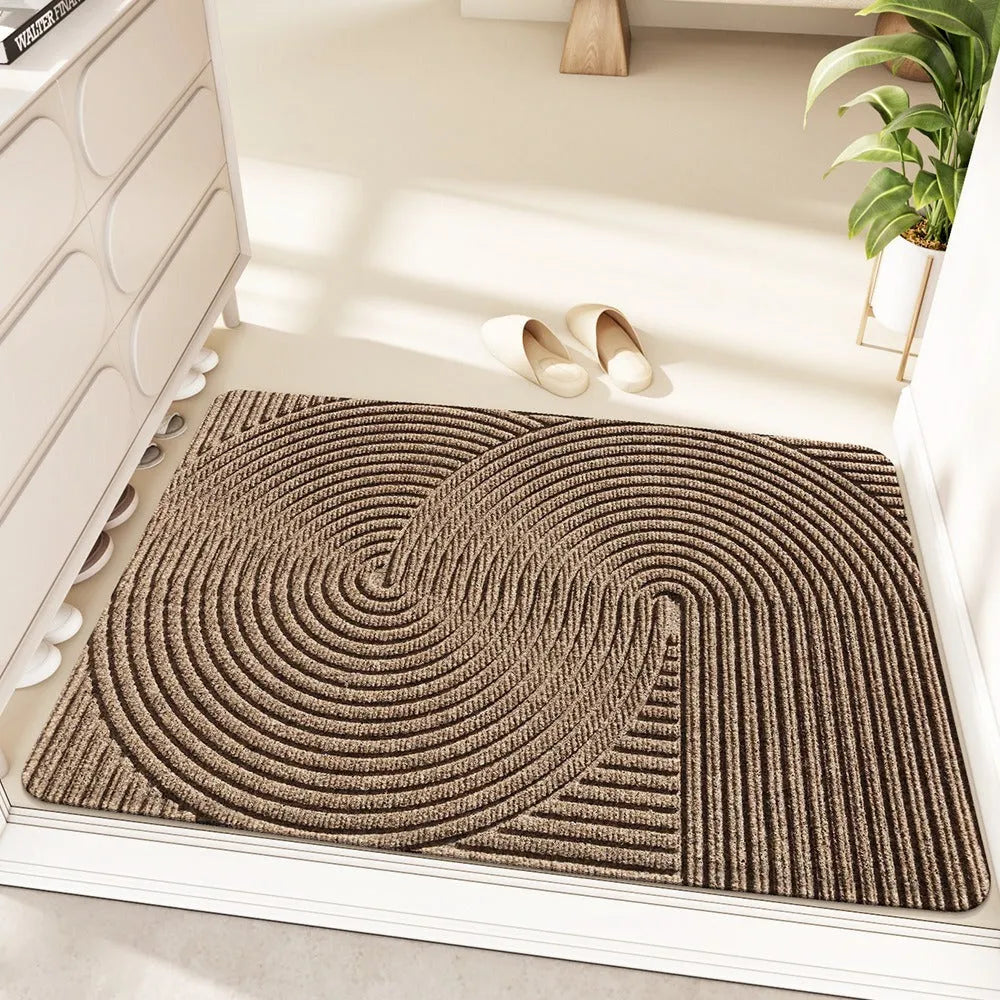 Diatom oil entrance mat with alien shape design in blue colour, measuring 60 by 90 centimetres