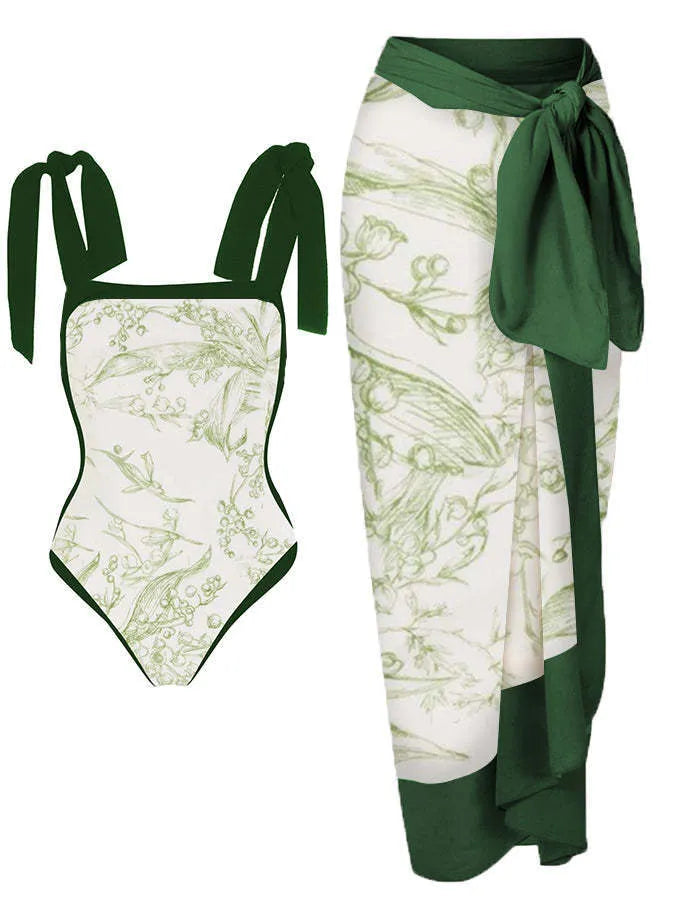 Women's two-piece floral printed polyester swimsuit with matching hip skirt in conservative style