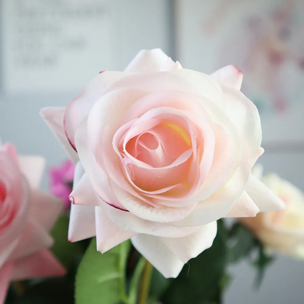 Silk fabric artificial rose bouquet in assorted colours with realistic petals, approximately 42cm long