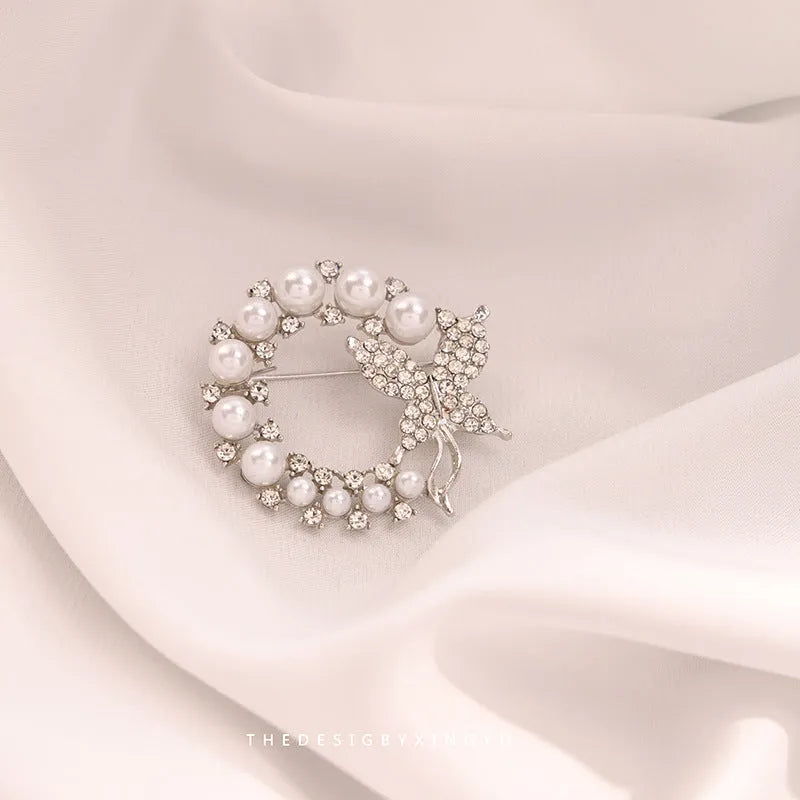 Alloy brooch in natural flower shape with electroplated finish, featuring adjustable and anti-exposure pin closure for women's coats and suits.