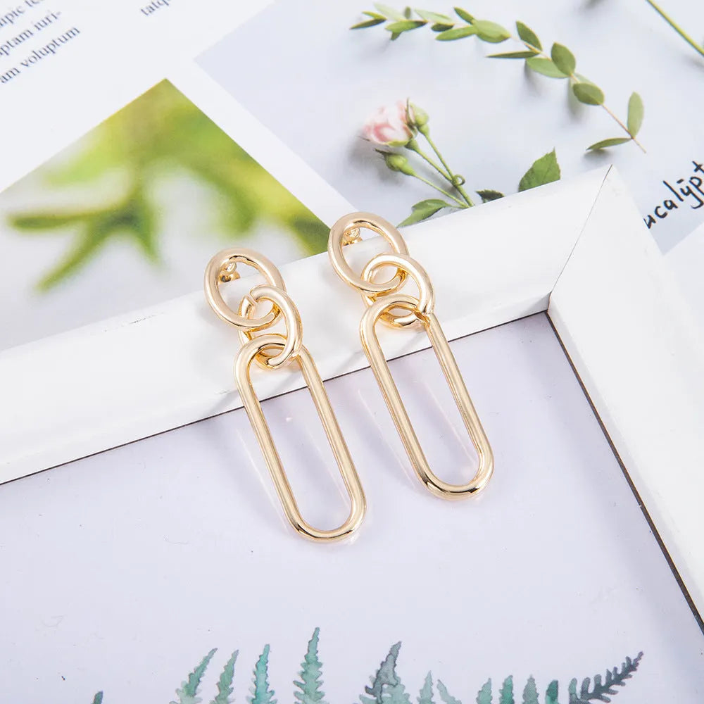 Geometric sterling silver needle hoop earrings for women with ring and line design