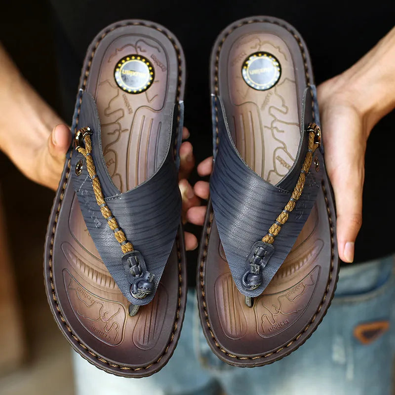 Men's dark blue herringbone pattern outdoor slippers with a rubber sole, shown from the side.