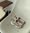 Girls casual slip-on shoes in black, beige, and pink with breathable mesh upper
