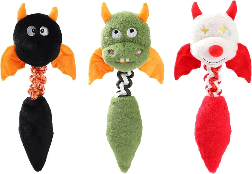 Large black plush dog toy with rope knot, shown next to a red and green version.