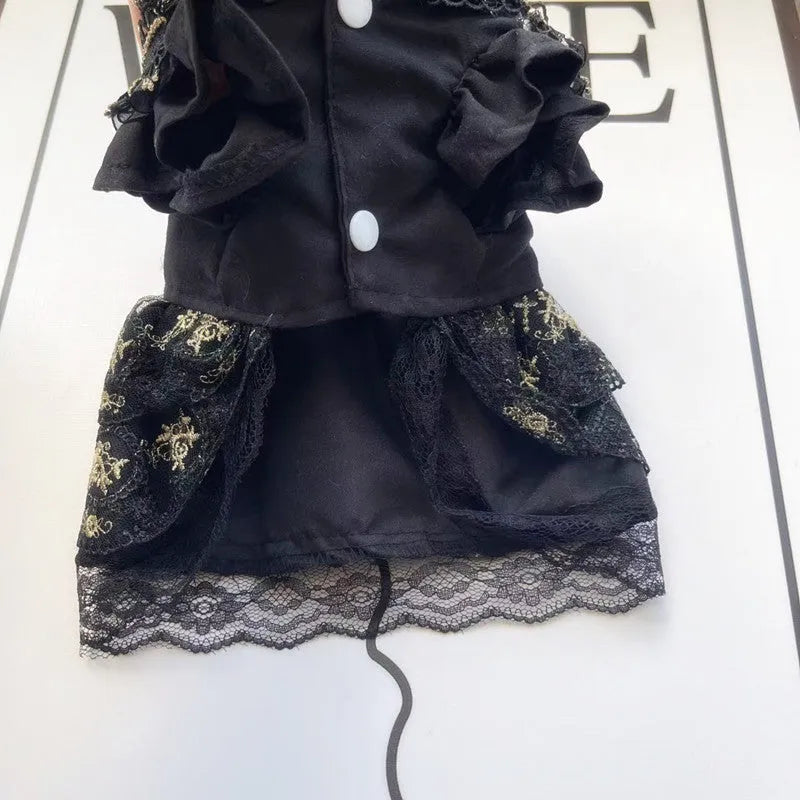 Golden Gothic princess skirt costume for a small dog on a mannequin, showing the tiered skirt design.