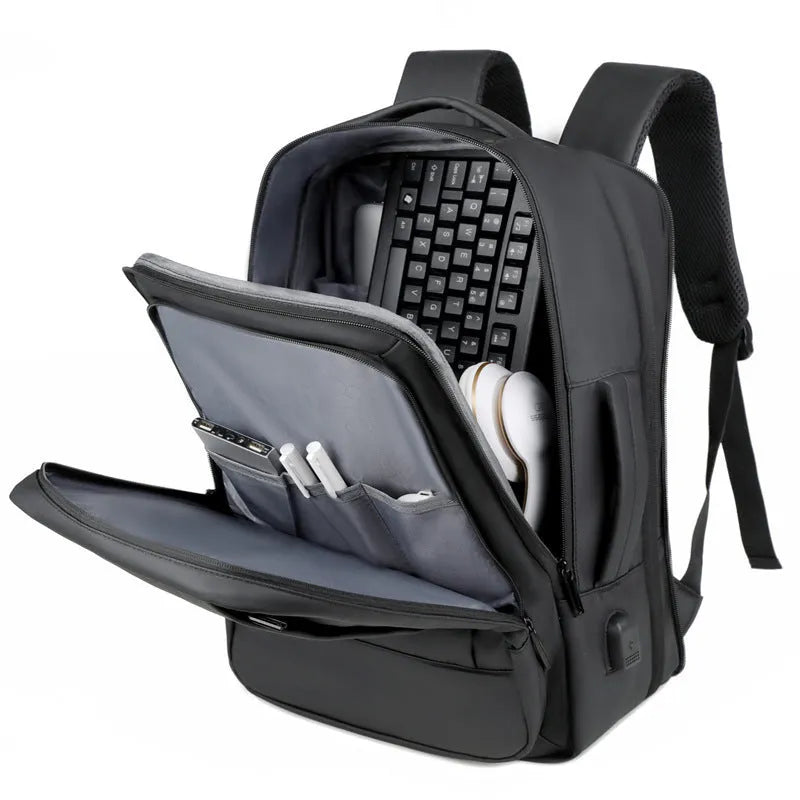Black waterproof Oxford cloth business backpack with curved shoulder straps and laptop compartment