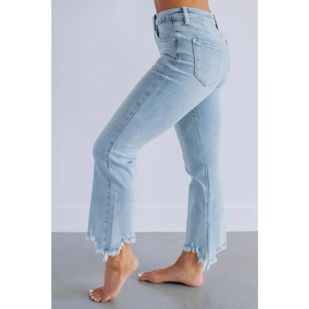 Women's dark blue cotton denim trousers with hand-worn finish, casual style