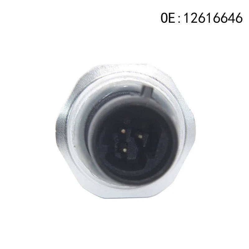 Silver metal General Motors fuel pressure sensor with part numbers 12616646 and 12677836.