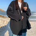 Women's loose fit knitted cardigan coat with long sleeves in black