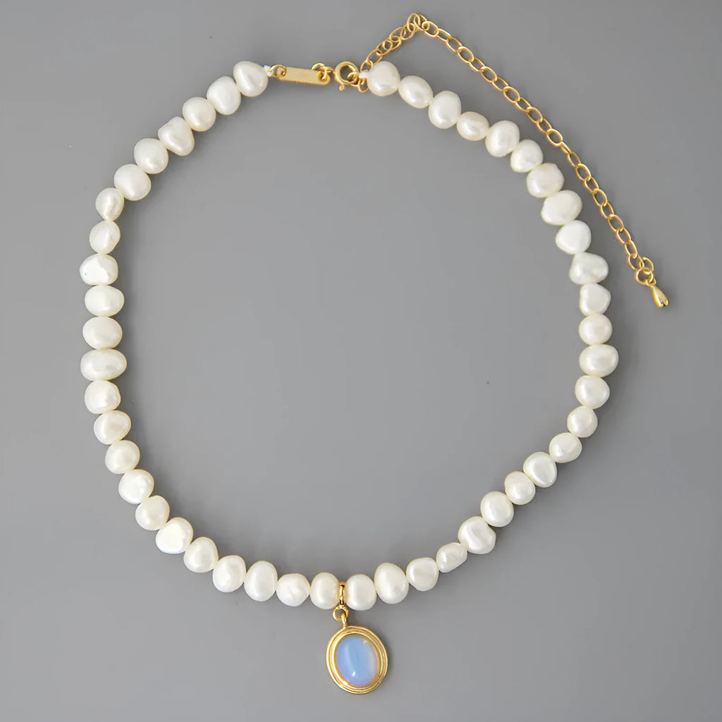 925 silver round medal pearl pendant necklace with irregular pearl geometric design on white background