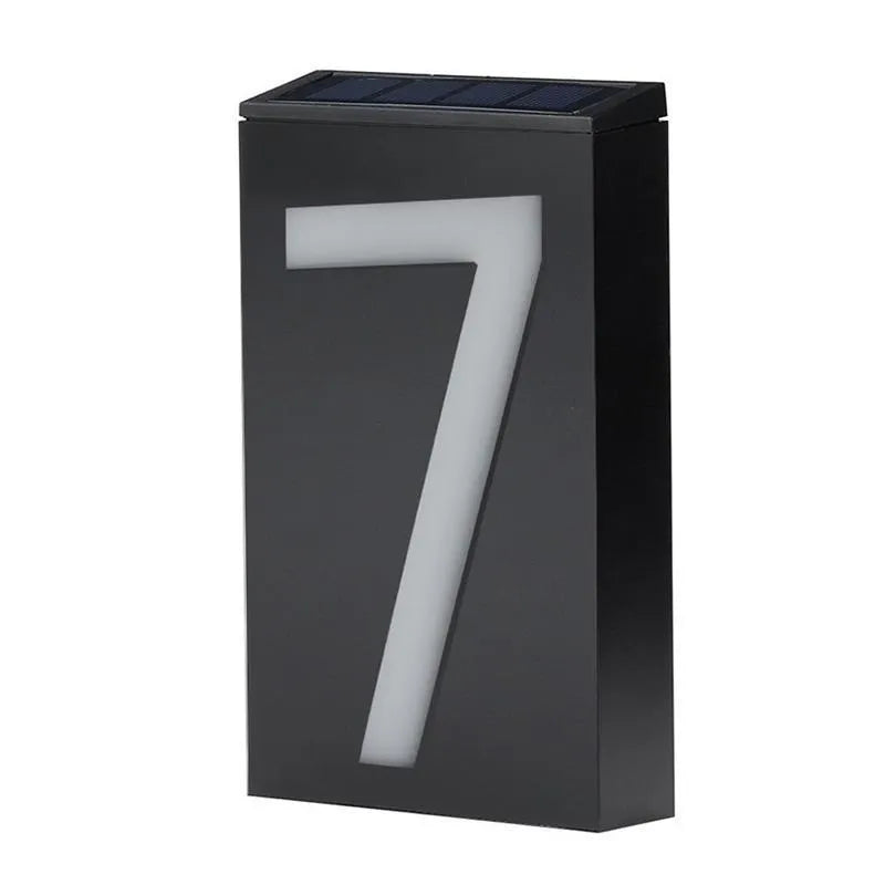 Solar powered house number light with white LEDs illuminating digit, IP65 waterproof outdoor design