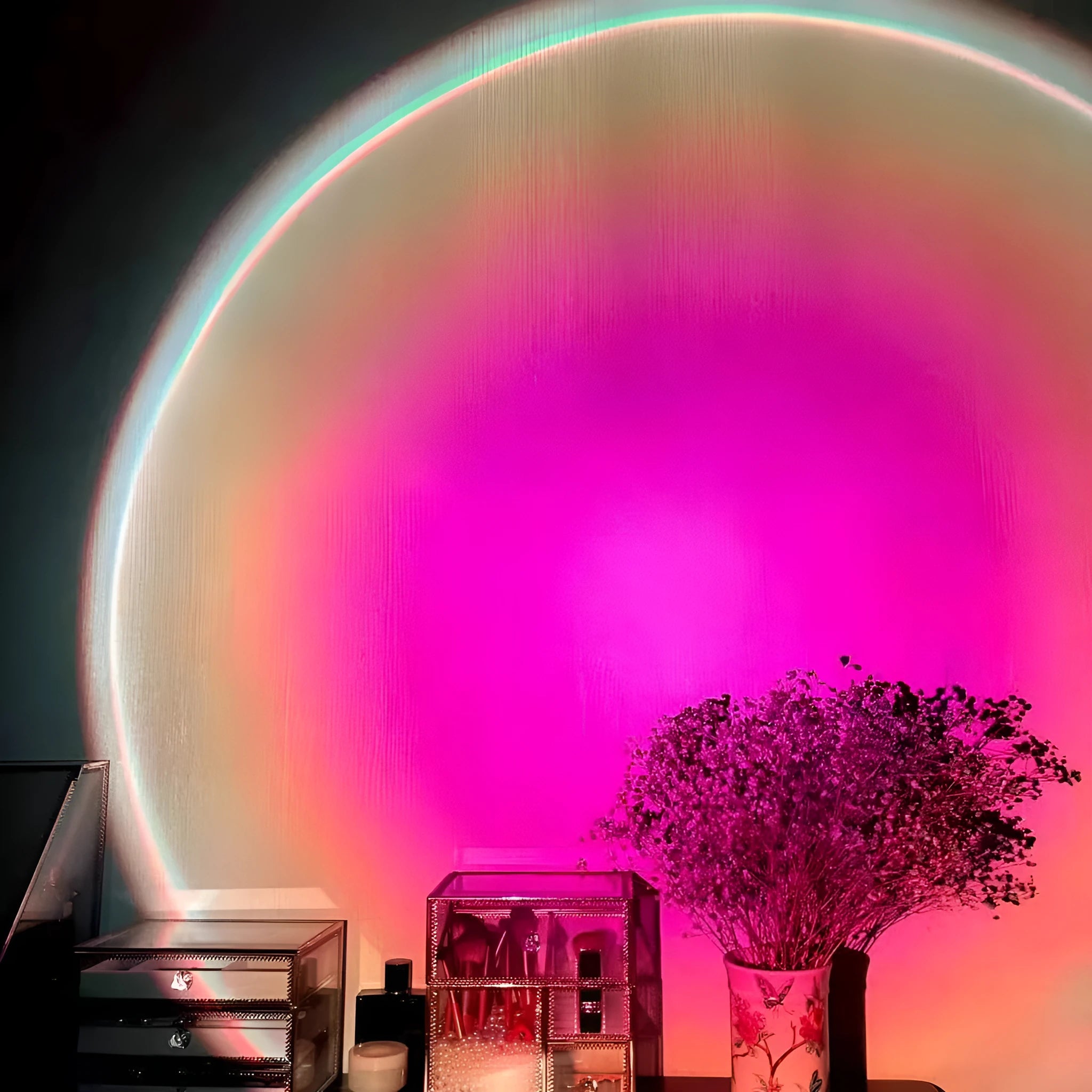 Sunset red coloured USB rechargeable projection lamp showing rainbow light projection