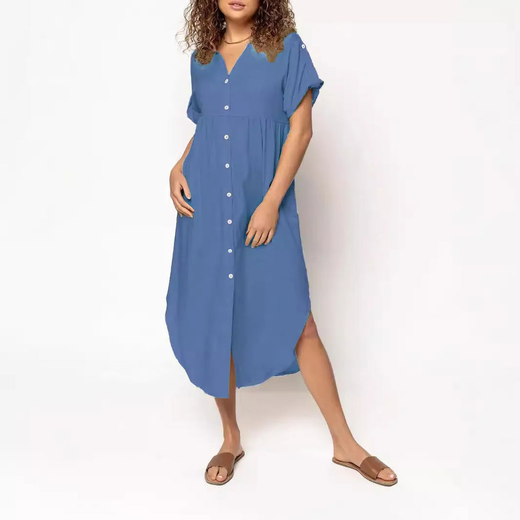 A loose-fitting, mid-length casual dress with button detail on the front, shown in a solid colour.