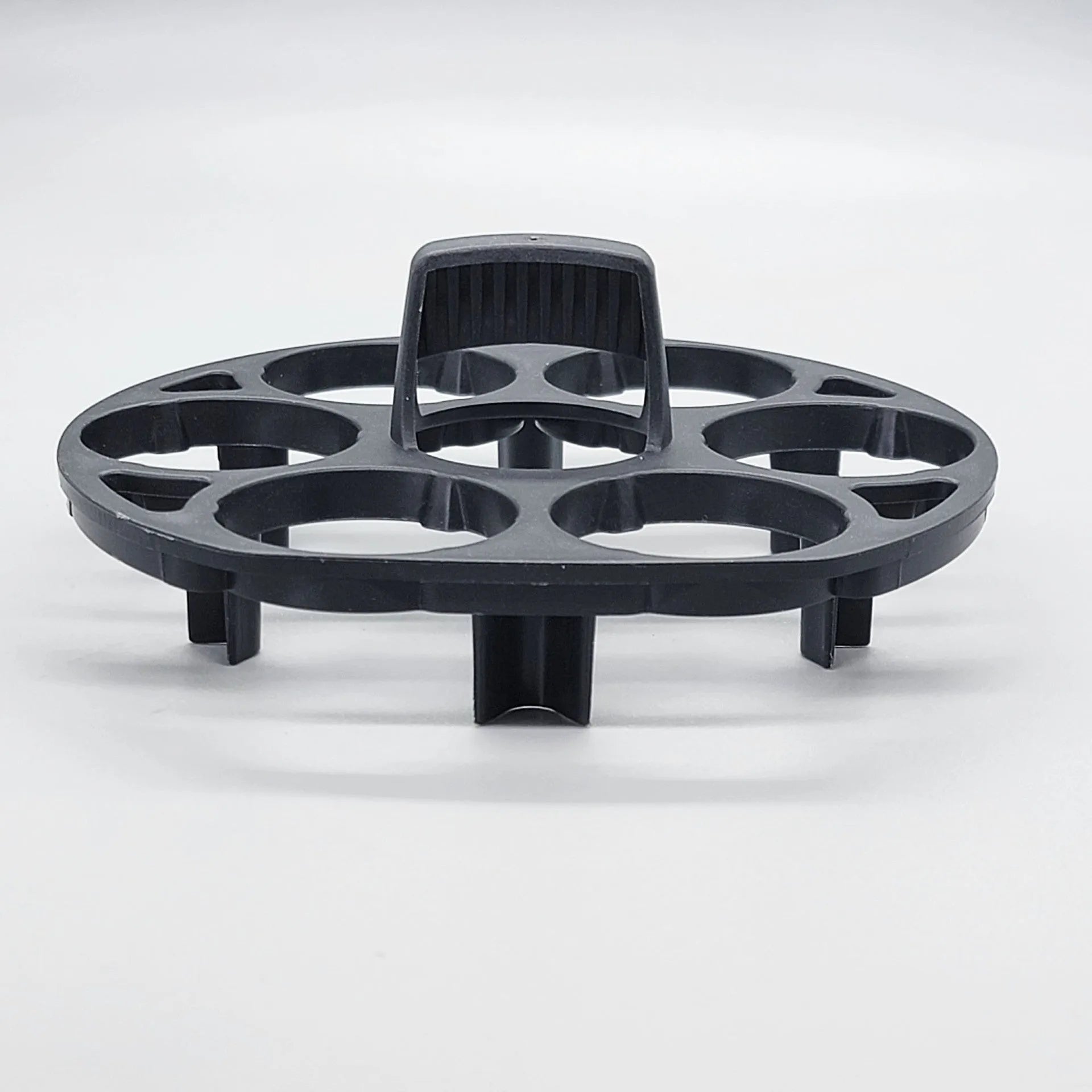 Black plastic egg holder rack with retainer basket design for kitchen organisation