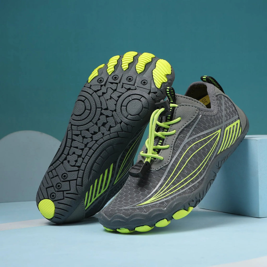 Children's black quick-drying water shoes with a non-slip rubber sole and elastic band.