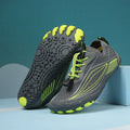 Children's black quick-drying water shoes with a non-slip rubber sole and elastic band.