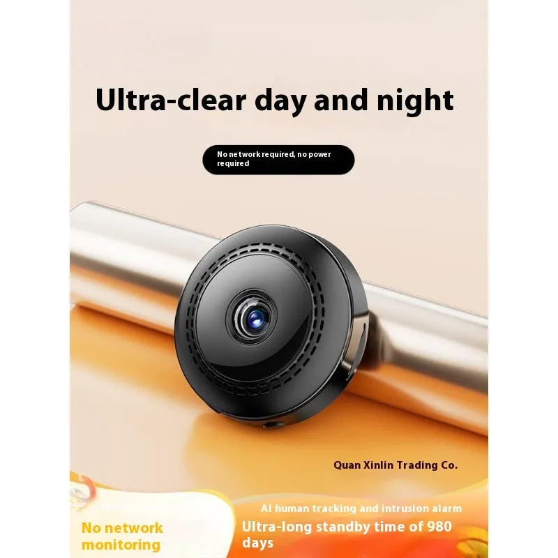 Wireless black security camera with 360-degree rotation on stand showing night vision capability
