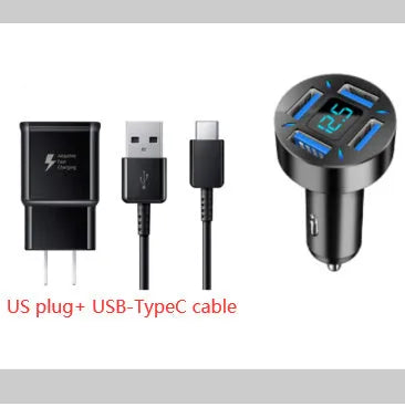 Black four-port USB car charger with digital LED display, shown plugged into a car dashboard.