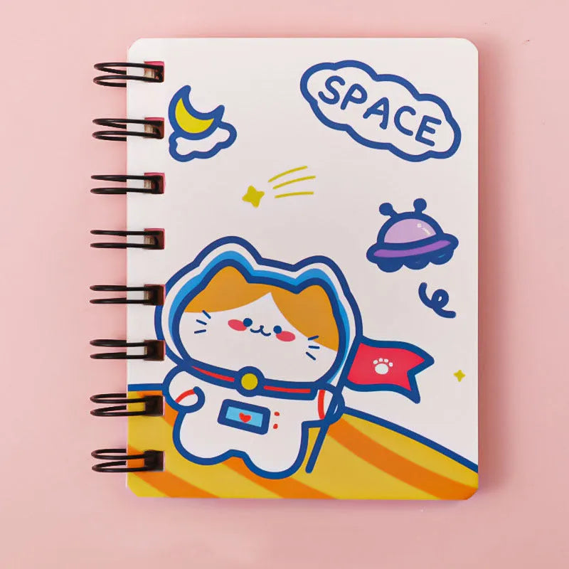 Astronaut flipped portable pocket notebook showing space-themed cover designs at 10.5 by 8 cm size