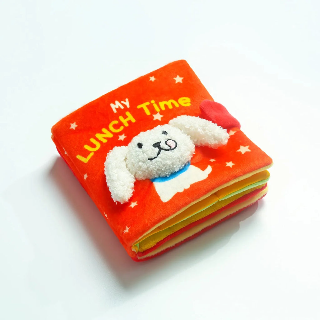 Red book shaped plush pet toy with hidden food compartment and squeaky sound for dogs and cats