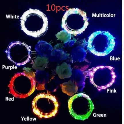 Wine bottle LED string lights with copper wire and bottle stopper for decorative illumination