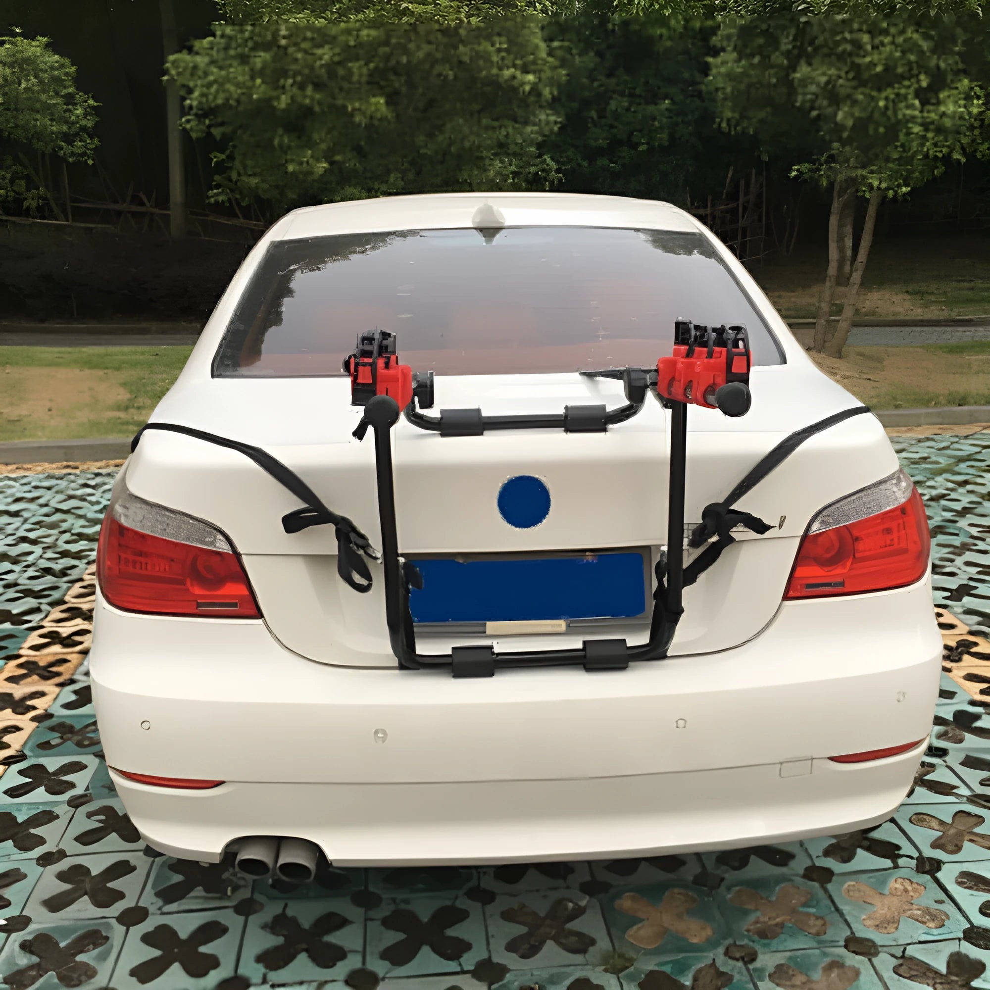 Black and red trunk-mounted bicycle rack with iron frame and choice of tie rope or pull belt straps
