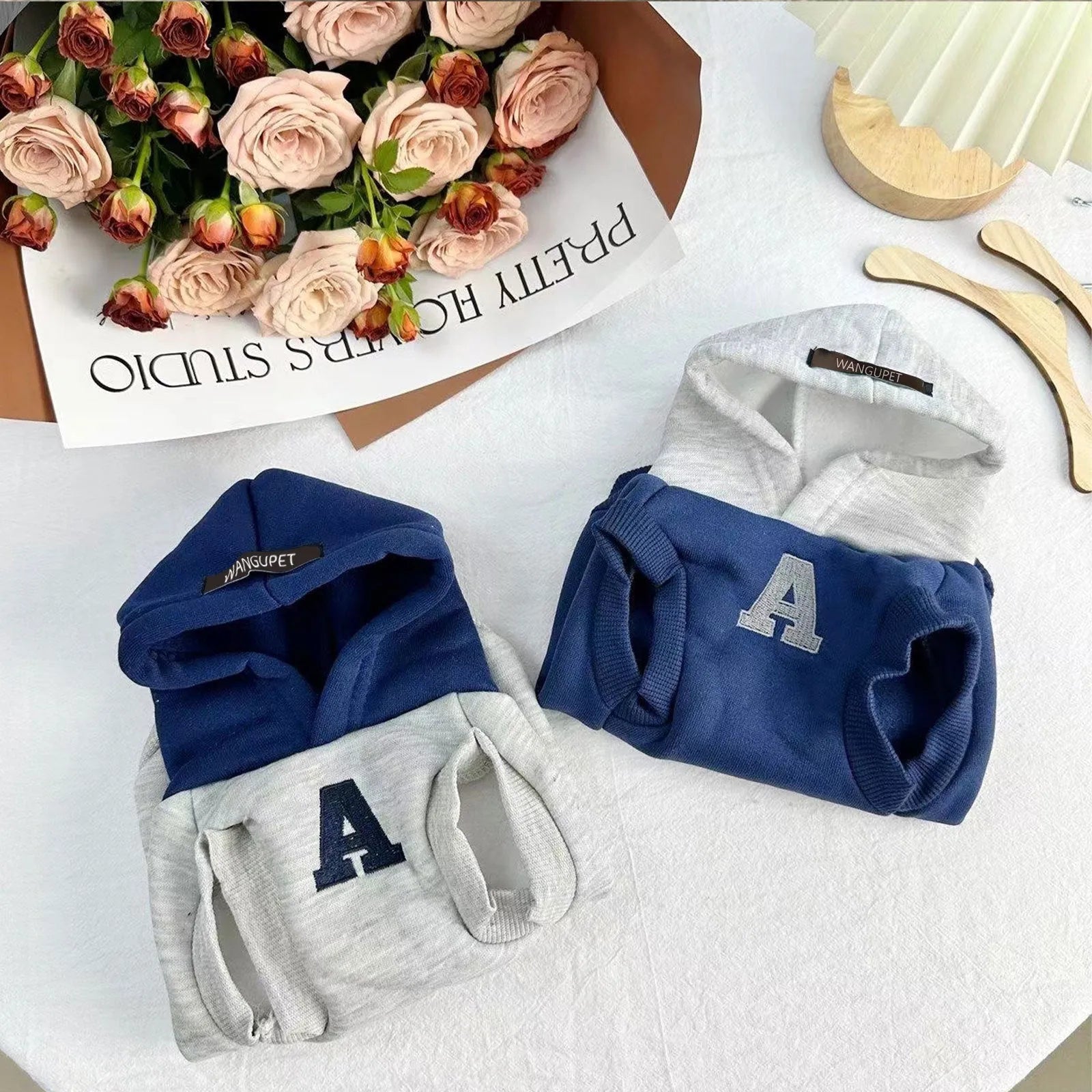 Blue and grey-white reflective letters pet hoodie for dogs and cats on mannequin