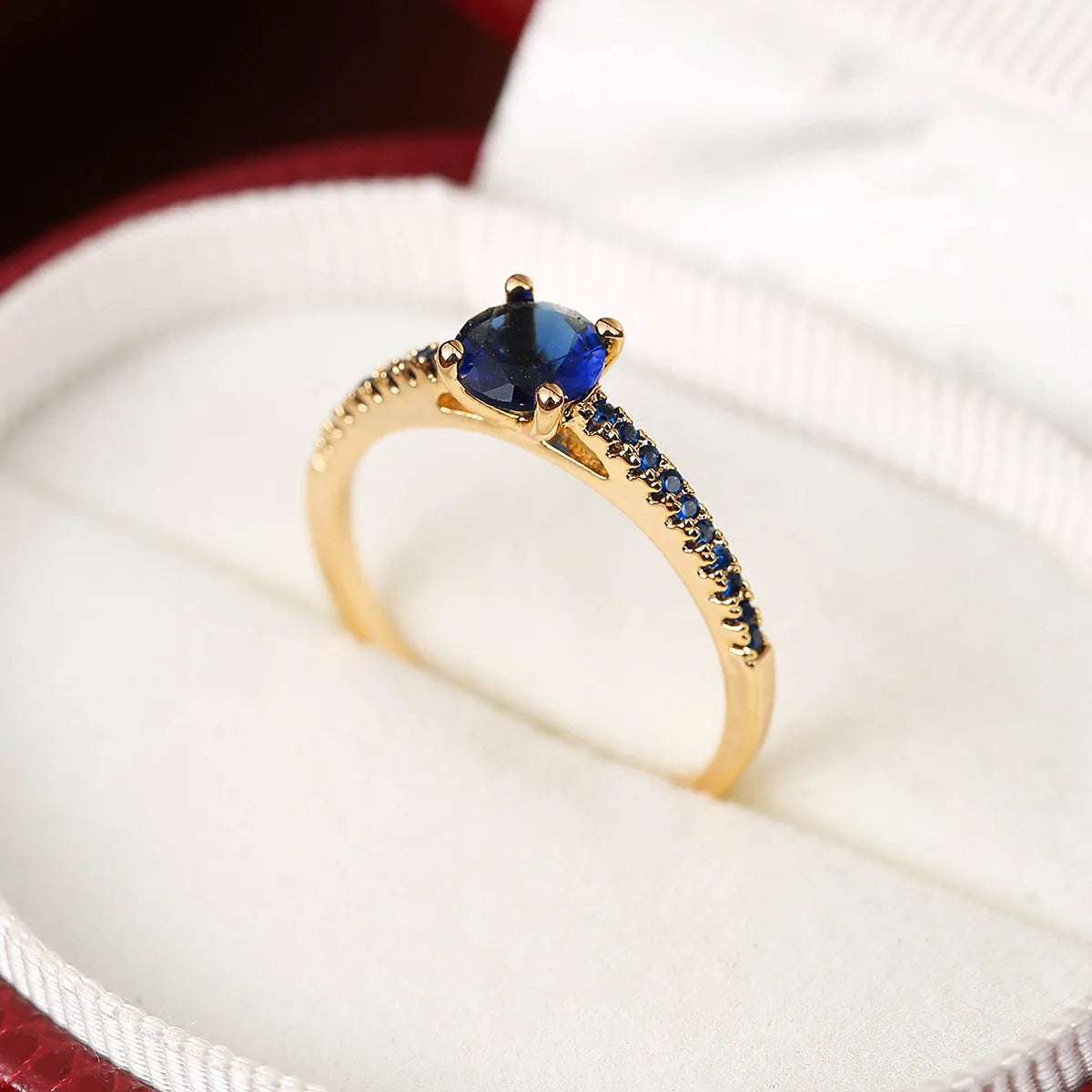Geometric hexagon copper ring with colourful zircon stones in gold or gun black electroplated finish.