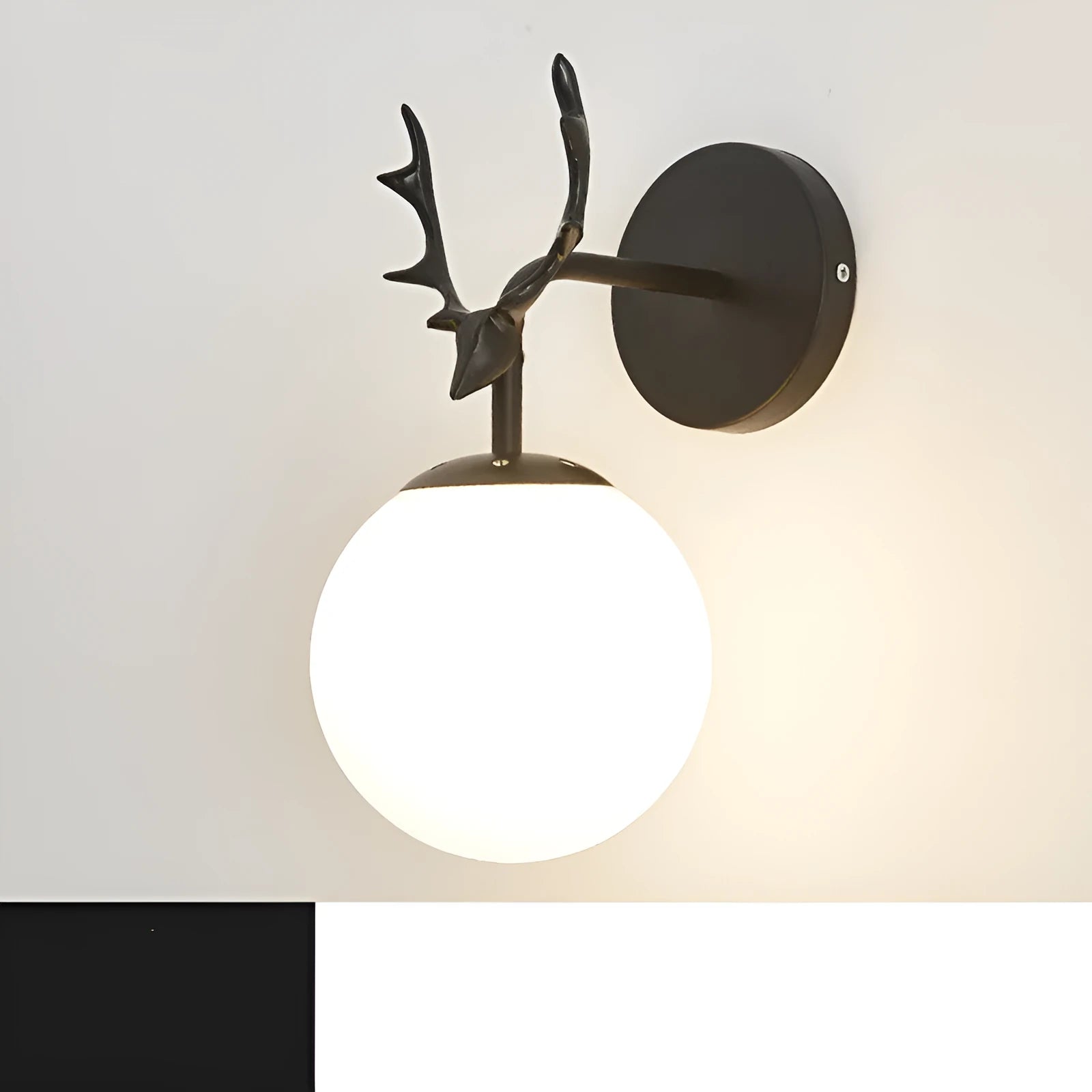 Minimalist round Nordic style glass wall lamp on a white wall