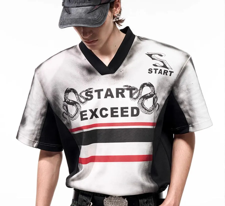 Black and white letter snake pattern printed women's V-neck short sleeve top with padded shoulders.