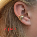 Gold electroplated alloy earrings with starfish and scallop shell designs for women's beach fashion