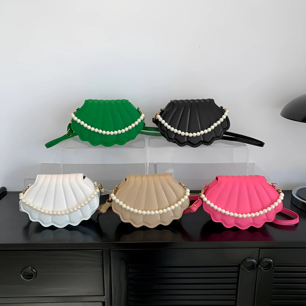 Women's simple messenger bag in PU shell shape with single shoulder strap, available in multiple colours