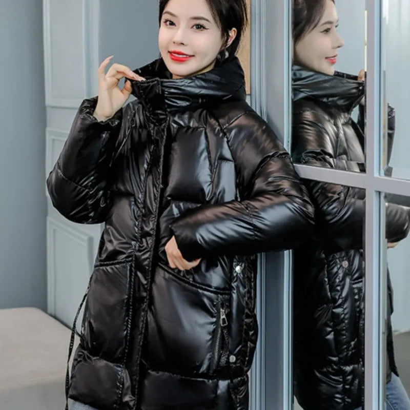 A women's loose-fitting thick hooded winter jacket in an acrylic polyester fabric.