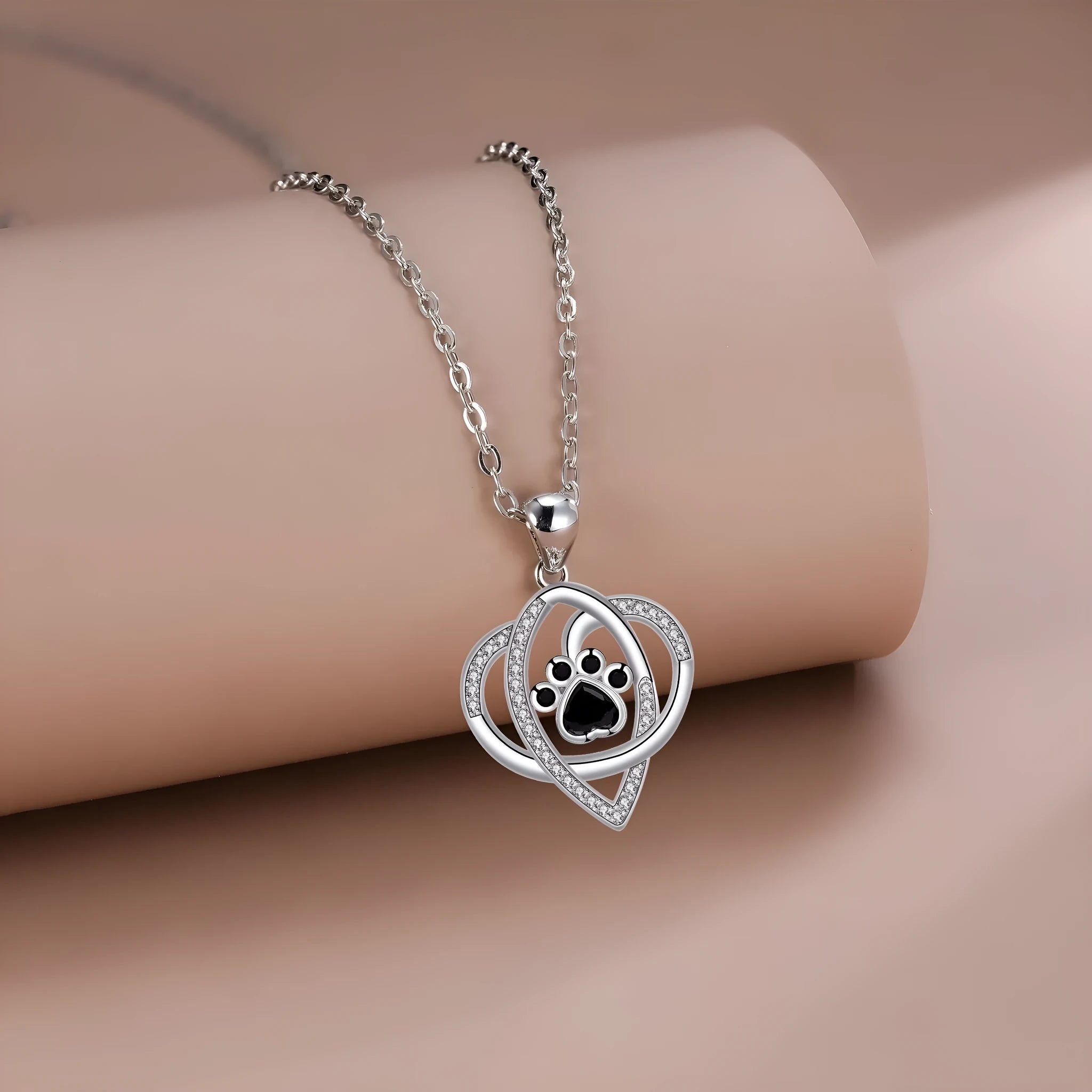 Copper necklace with dog and cat paw print pendant on cross chain with electroplated finish