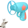 Blue interactive cat toy gun with plastic frisbee mounted ready for launching
