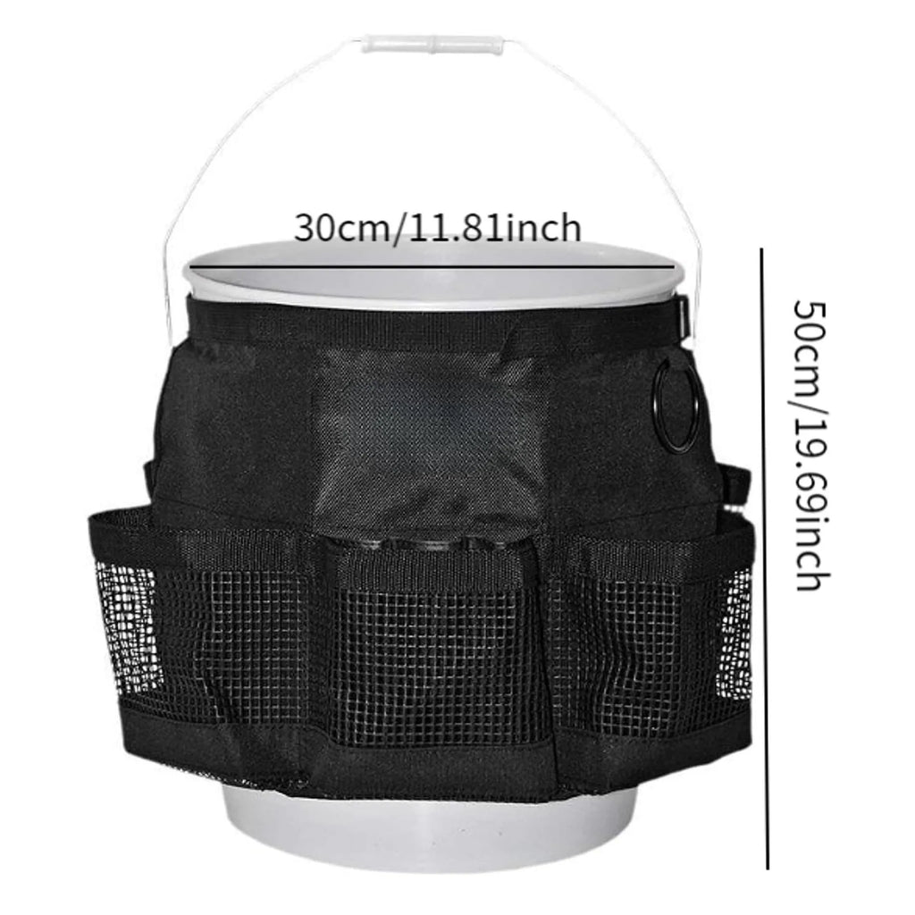 Black cylindrical polyester storage bag hanging on a 5 gallon barrel for tools and toiletries.