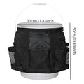 Black cylindrical polyester storage bag hanging on a 5 gallon barrel for tools and toiletries.