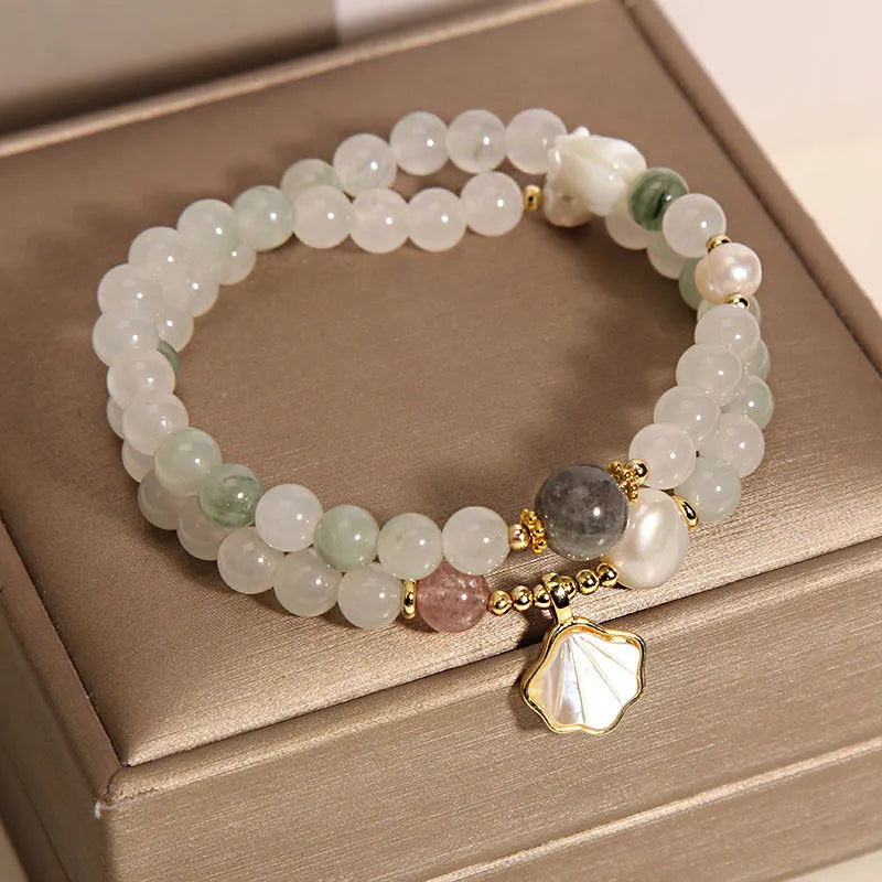 Tianshan emerald green crystal bracelet with gold-plated apricot leaf pendant and rhinestone details