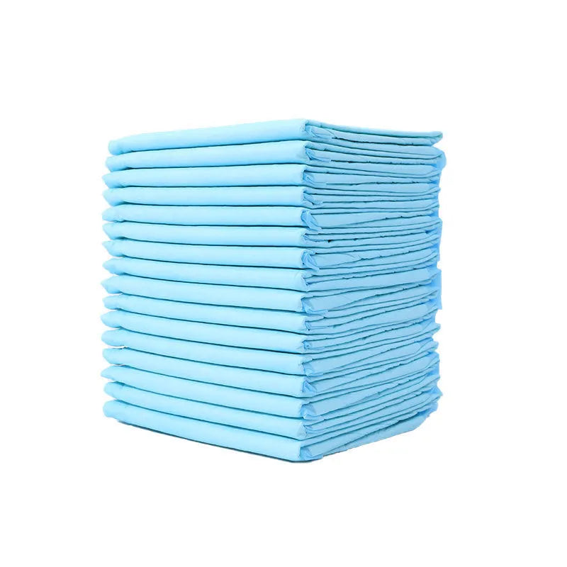 Pack of white pet urinal pads with blue trim, shown alongside a tape measure indicating the 45x60cm M size dimensions.