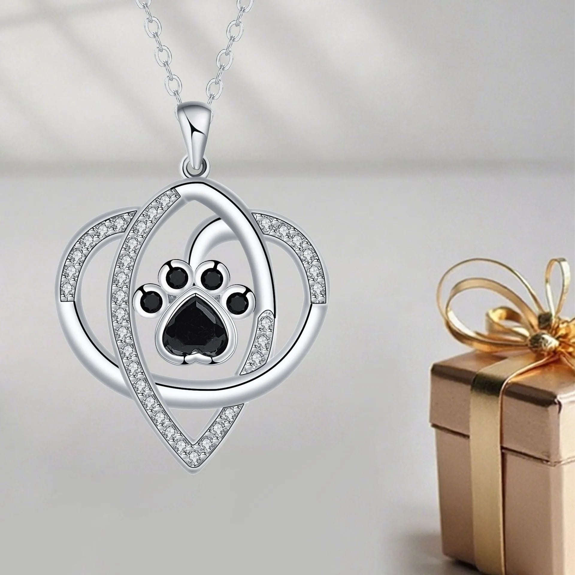 Copper necklace with dog and cat paw print pendant on cross chain with electroplated finish