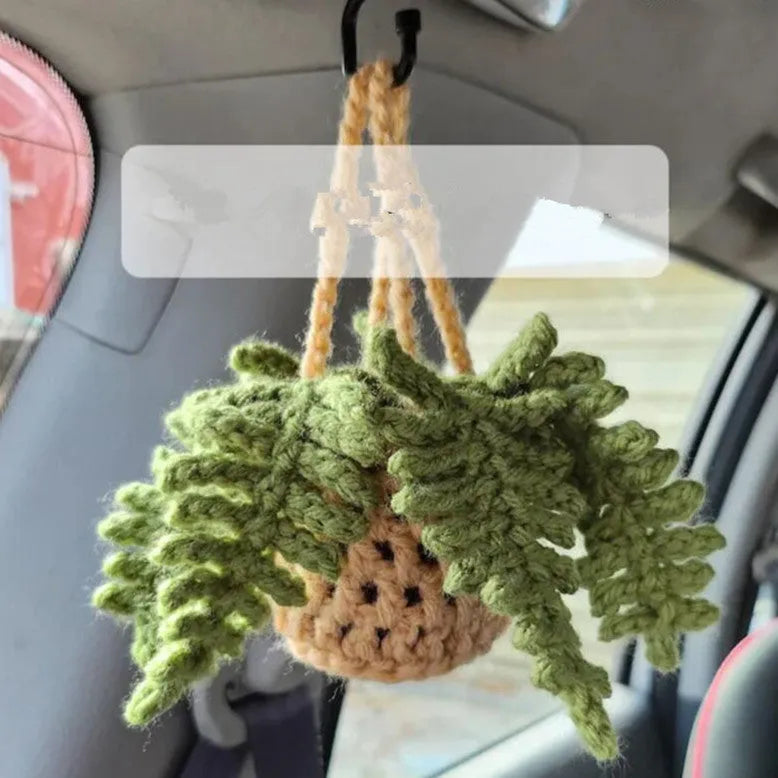 Green and white knitted rope car plant ornament with 8cm base and hanging rope.