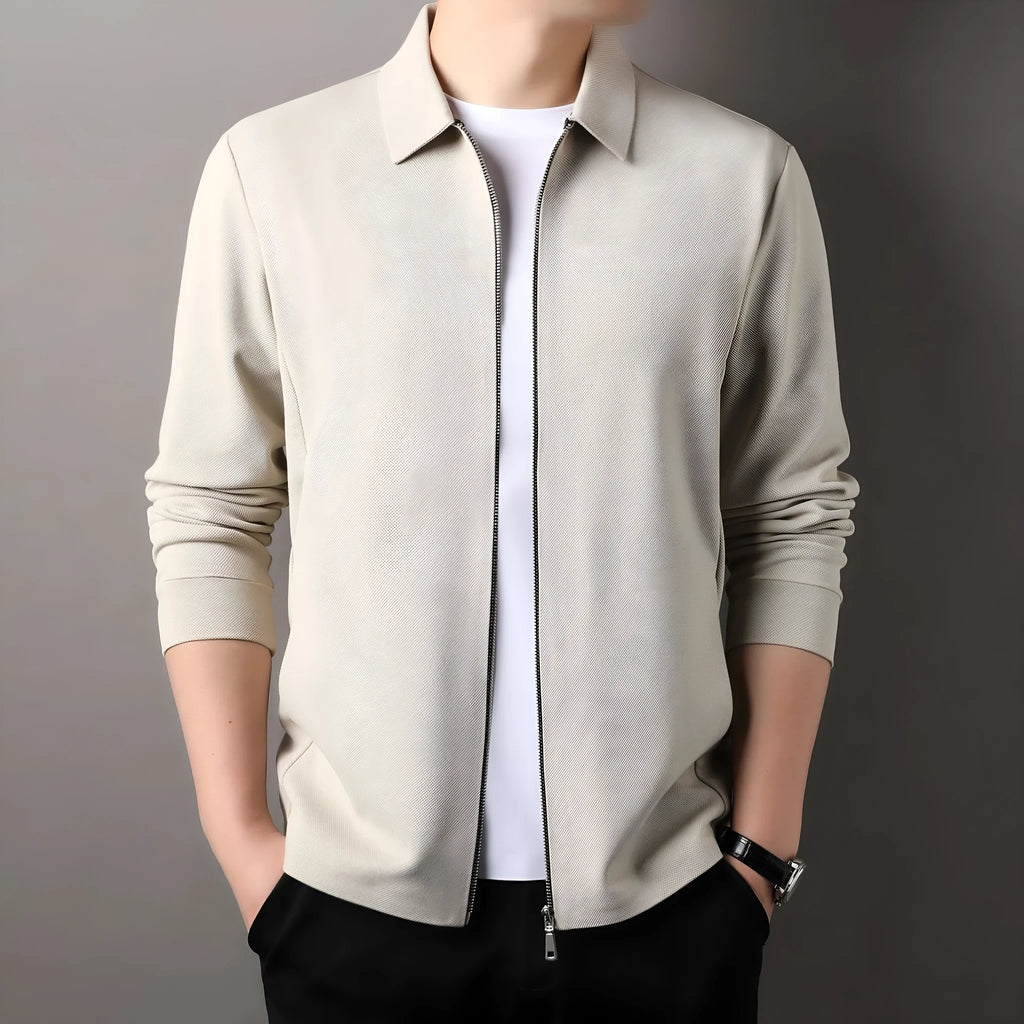 Men's casual business jacket in black, dark grey, or apricot with long sleeves and a straight hem.